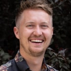 Colton Pond, CMO of LoanPro in a floral shirt